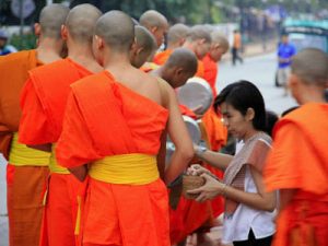 Alms giving in Laos